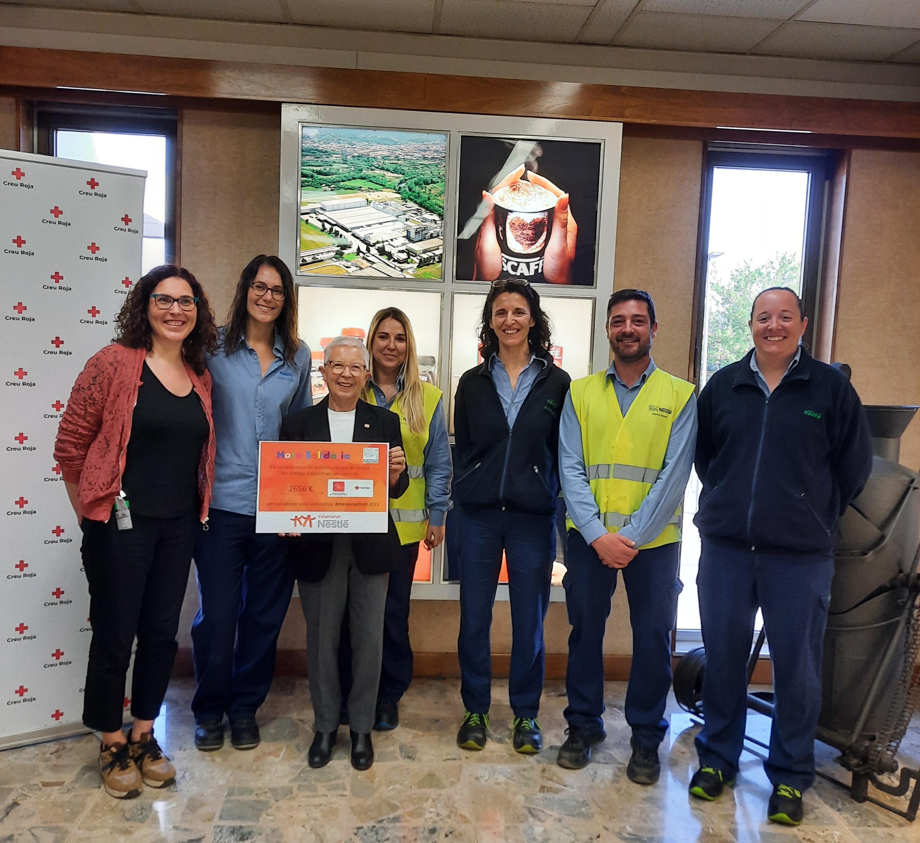 La fàbrica de Nestlé de Girona i la Creu Roja, juntes per oferir beques menjador a secundària